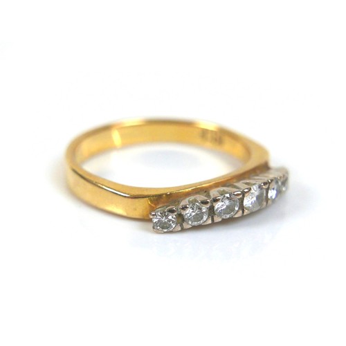 240 - An 18ct yellow gold and diamond ring, set with a gently bowed row of seven round cut stones, 2.5 to ... 