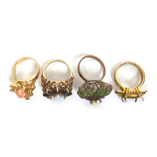 199 - A group of four dress rings, comprising one 9ct yellow gold flowerhead ring, set with an opal surrou... 