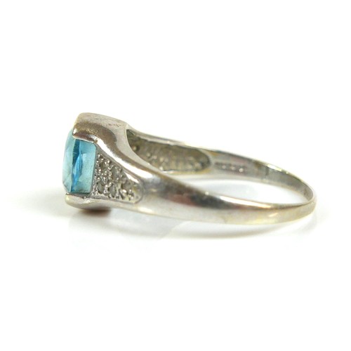 174 - Two 9ct white gold blue stone dress rings, possibly topaz, comprising a square cut stone ring, centr... 