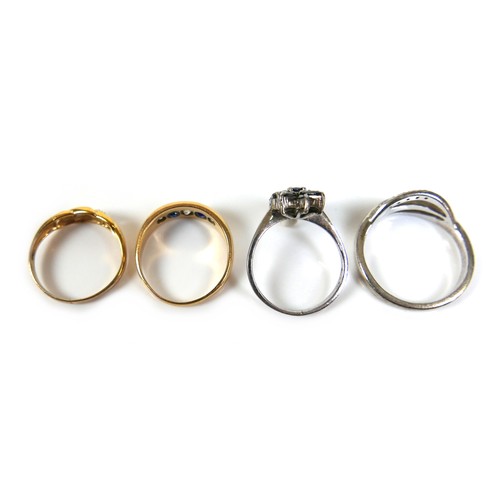 236 - A group of four rings, comprising a 9ct yellow gold five stone diamond and sapphire ring, each round... 