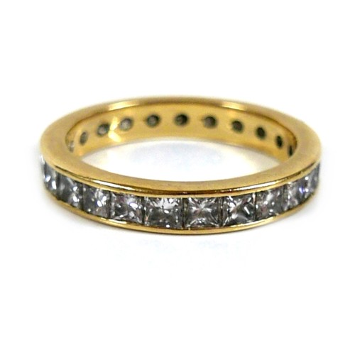 310 - An 18ct yellow gold and diamond full eternity ring, set with twenty five princess cut stones, each a... 