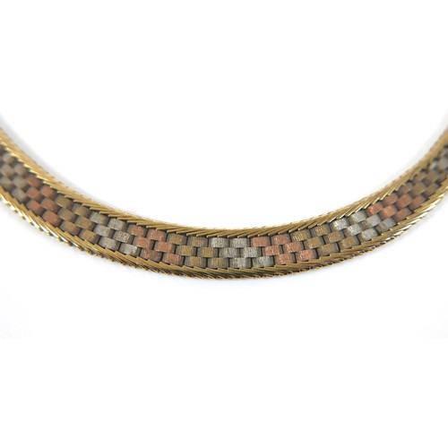 267 - A 9ct tri-gold flatweave necklace, stamped 9kt, 21.9g, 40.5cm long.