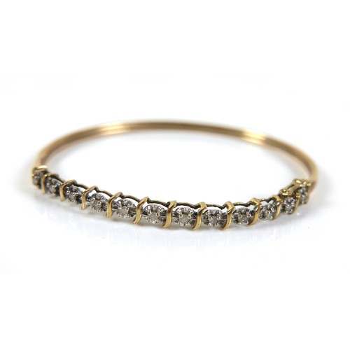 234 - A twelve stone diamond and yellow metal bangle, each diamond approximately 1.5mm diameter, 6g, 6.5 b... 