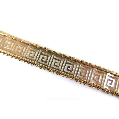 263 - A 14ct gold bracelet, with pierced Greek key design, stamped 'Mexico 14kt', 9.2g, 17.8cm long.