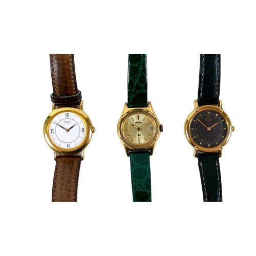 115 - A group of three Seiko lady's wristwatches, with blue Seiko bag. (4)