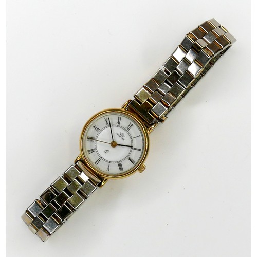 113 - A Marvin 9ct gold cased lady's wristwatch, circular white dial with black Roman numerals, black hand... 