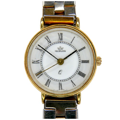 113 - A Marvin 9ct gold cased lady's wristwatch, circular white dial with black Roman numerals, black hand... 