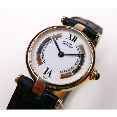 129 - A vintage Must de Cartier lady's wristwatch, model 1851, silver gilt circular case, the white dial i... 