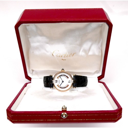 129 - A vintage Must de Cartier lady's wristwatch, model 1851, silver gilt circular case, the white dial i... 