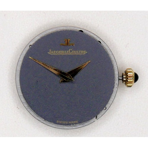 126 - A Jaeger LeCoultre 18ct gold cased lady's wristwatch, model 9201-21, with minimalist grey dial, blac... 