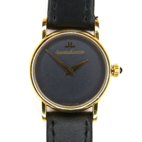 126 - A Jaeger LeCoultre 18ct gold cased lady's wristwatch, model 9201-21, with minimalist grey dial, blac... 