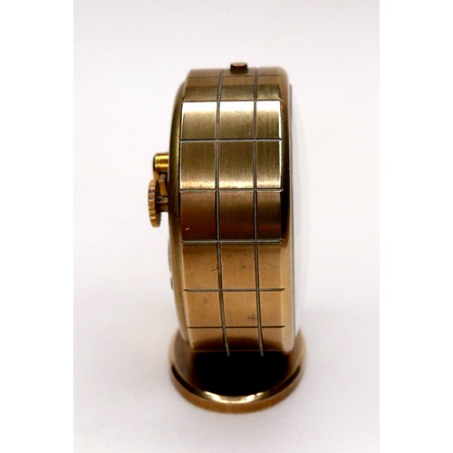 109 - A Cartier Memovox style travel alarm clock, with Arabic and golden baton dial, inner alarm dial, 8 d... 