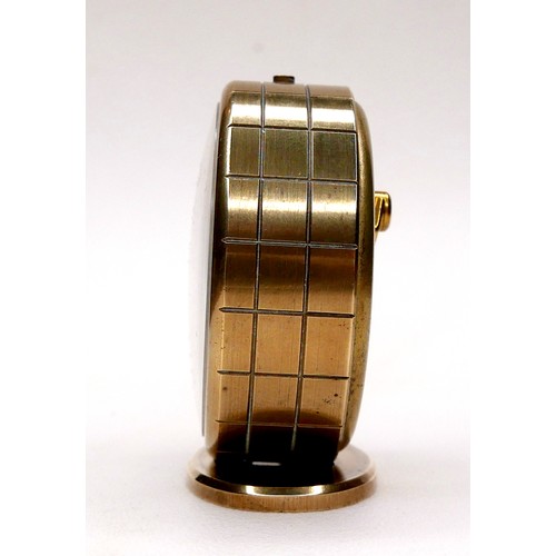 109 - A Cartier Memovox style travel alarm clock, with Arabic and golden baton dial, inner alarm dial, 8 d... 