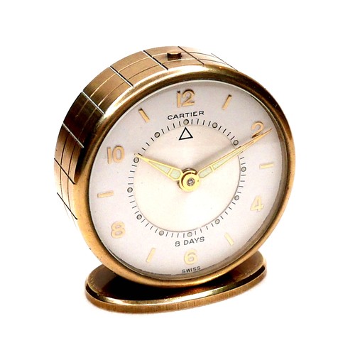 109 - A Cartier Memovox style travel alarm clock, with Arabic and golden baton dial, inner alarm dial, 8 d... 