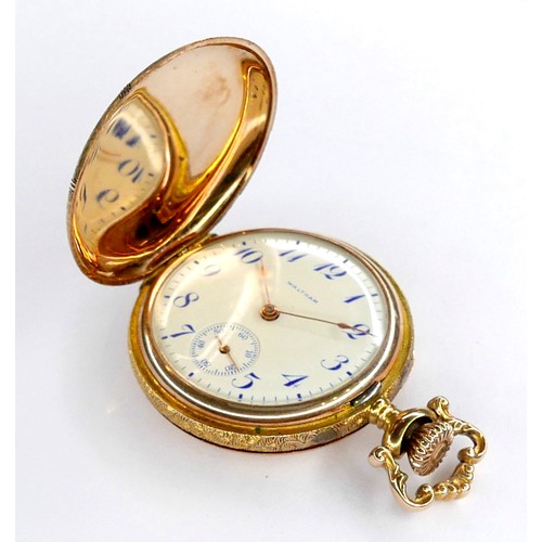 107 - A 14K yellow gold Waltham lady's hunter pocket watch, keyess wind, the white dial with blue Breguet ... 