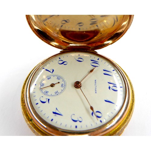 107 - A 14K yellow gold Waltham lady's hunter pocket watch, keyess wind, the white dial with blue Breguet ... 