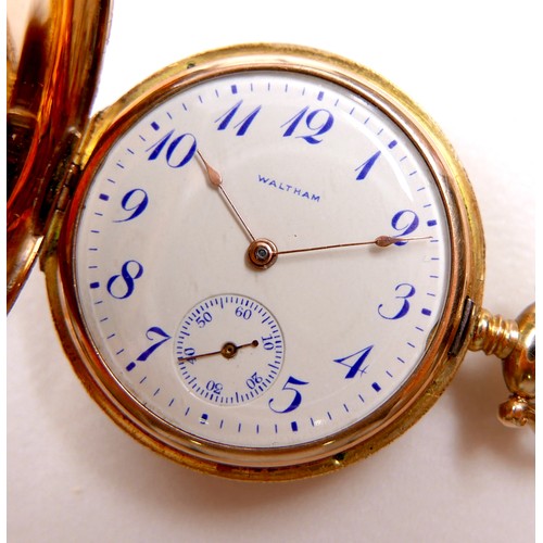 107 - A 14K yellow gold Waltham lady's hunter pocket watch, keyess wind, the white dial with blue Breguet ... 