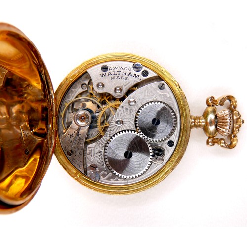 107 - A 14K yellow gold Waltham lady's hunter pocket watch, keyess wind, the white dial with blue Breguet ... 