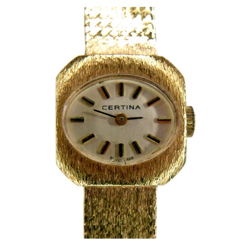 128 - A Certina 14ct yellow gold cased lady's wristwatch, circa 1970s, oval silvered dial with silver and ... 