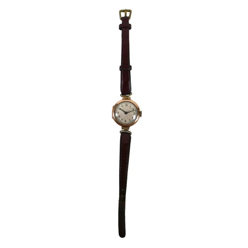 112 - An Art Deco 9ct gold lady's wristwatch, with hand painted dial, blued steel hands, on a burgundy lea... 