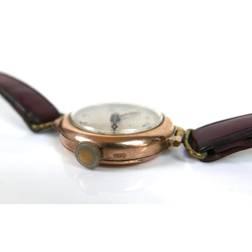 112 - An Art Deco 9ct gold lady's wristwatch, with hand painted dial, blued steel hands, on a burgundy lea... 