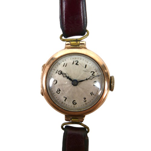 112 - An Art Deco 9ct gold lady's wristwatch, with hand painted dial, blued steel hands, on a burgundy lea... 