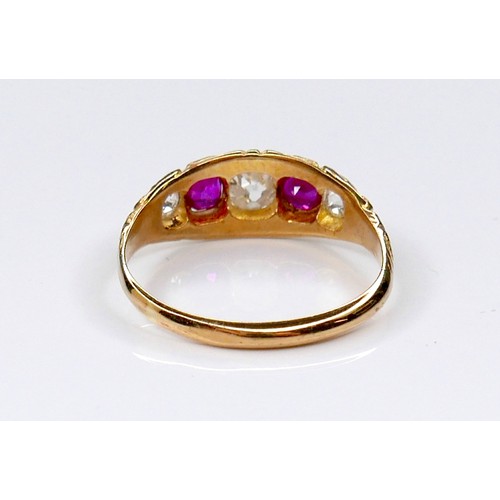 288A - An Edwardian 18ct yellow gold, diamond and ruby five-stone ring, the central oval faceted cut diamon... 