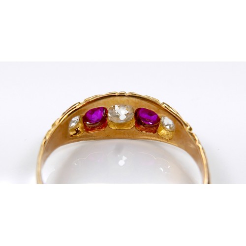 288A - An Edwardian 18ct yellow gold, diamond and ruby five-stone ring, the central oval faceted cut diamon... 