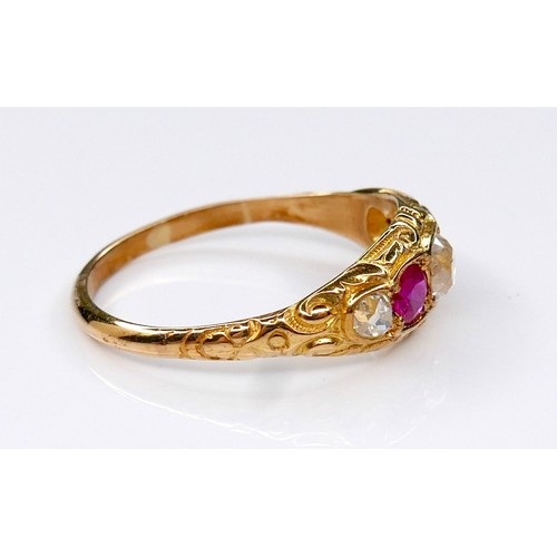 288A - An Edwardian 18ct yellow gold, diamond and ruby five-stone ring, the central oval faceted cut diamon... 