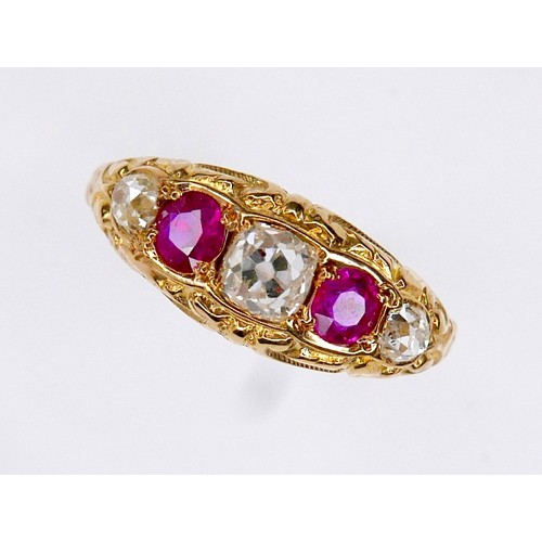 288A - An Edwardian 18ct yellow gold, diamond and ruby five-stone ring, the central oval faceted cut diamon... 