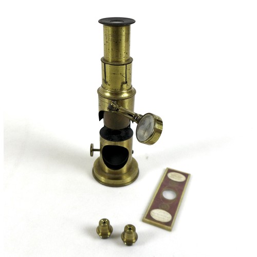 235 - An early 20th century brass students field microscope  in a mahogany box, box size 17cm by 7cm by 5c... 