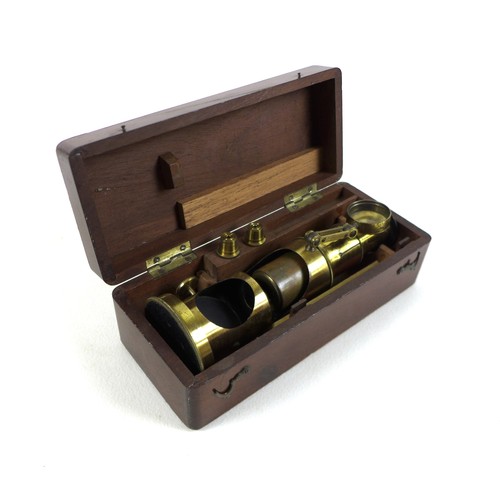 235 - An early 20th century brass students field microscope  in a mahogany box, box size 17cm by 7cm by 5c... 