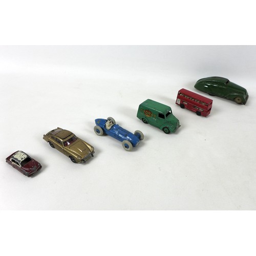 264 - An interesting collection of vintage toys and die-cast vehicles including a damaged Tri-ang minic Ja... 