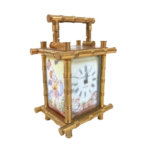 221 - A miniature brass faux bamboo carriage clock with decorative panels 7cm by 5.5cm by 11cm tall with k... 