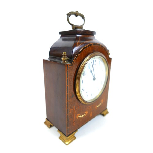 220 - An Edwardian inlaid mahogany mantel clock with a Buren movement, with key, 14 by 23cm.