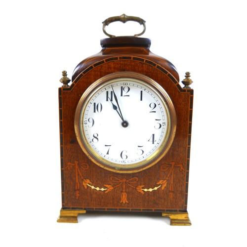 220 - An Edwardian inlaid mahogany mantel clock with a Buren movement, with key, 14 by 23cm.