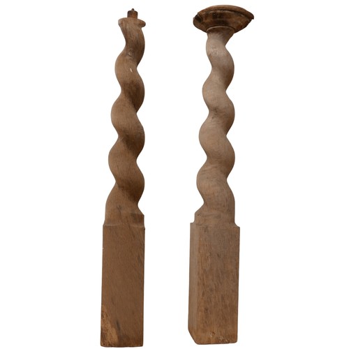 247 - A pair of 17th century oak barley twist columns, 13 by 13 by 107cm high. (2)