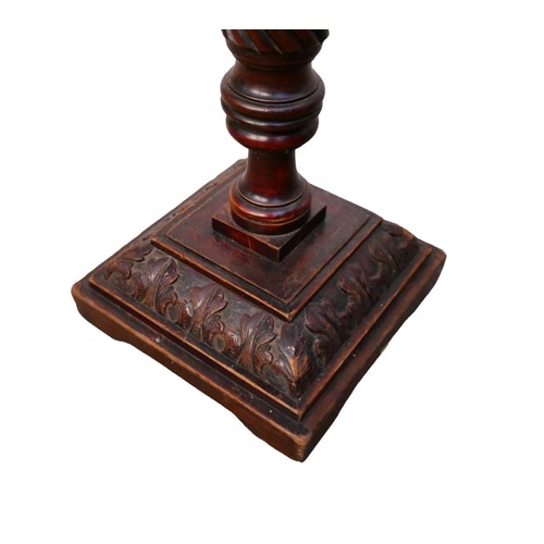 348 - A Georgian mahogany spiral carved standard lamp, with a square carved stepped base, made from a bed ... 