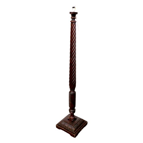 348 - A Georgian mahogany spiral carved standard lamp, with a square carved stepped base, made from a bed ... 