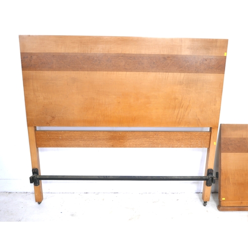 493 - An Art Deco double bed headboard, 137 by 126cm, and footboard, 137 by 58cm, maple and burr walnut ve... 