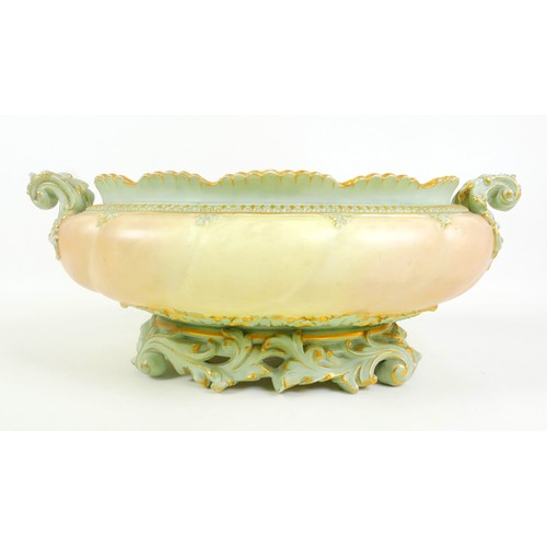 79 - A Victorian Royal Worcester china large oval blush planter or jardiniere, with twin acanthus side ha... 