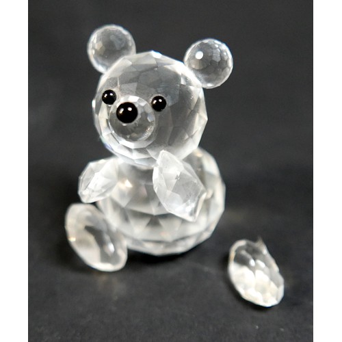 176 - A collection of fifteen Swarovski animal figurines, including a panda, a seals, teddy bears, a snail... 