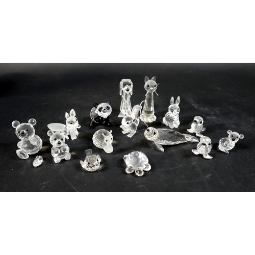 176 - A collection of fifteen Swarovski animal figurines, including a panda, a seals, teddy bears, a snail... 