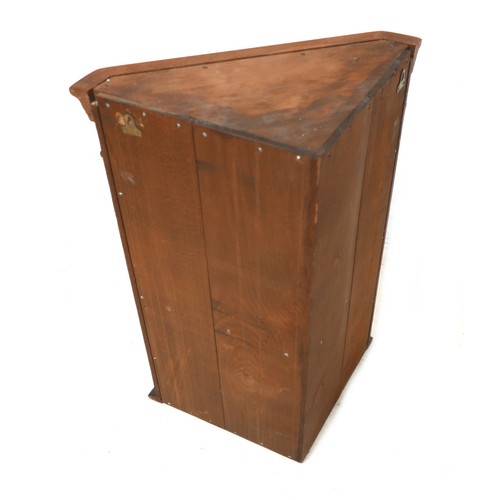 497 - An oak leaded glazed corner cupboard, 53 by 72cm.