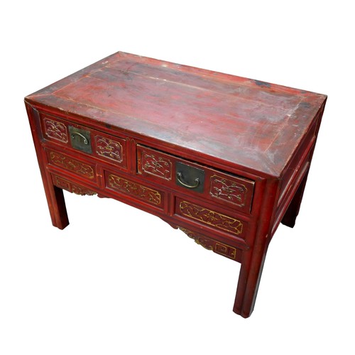 541 - A Chinese red lacquer two drawer low side table, 88 by 55 by 60cm high.