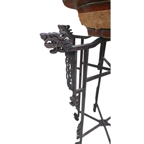 253 - A Chinese carved wooden folding stand with associated bowl, 67 by 86 cm.