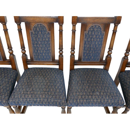 551 - A set of six Titchmarsh & Goodwin oak dining chairs, including two carvers, all with padded backrest... 