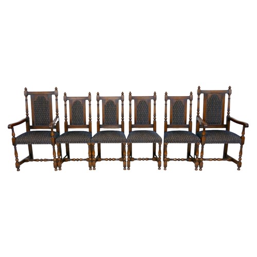 551 - A set of six Titchmarsh & Goodwin oak dining chairs, including two carvers, all with padded backrest... 