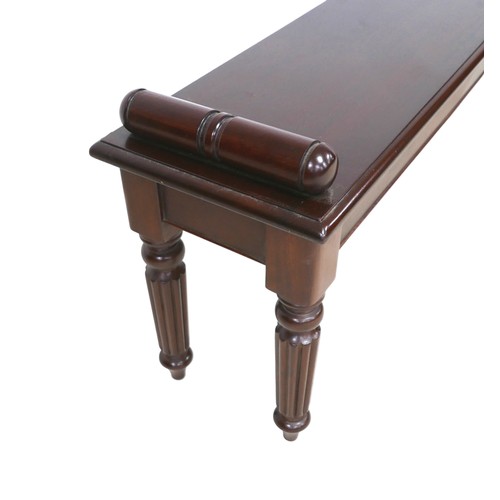 545 - A modern mahogany carpenter made Victorian style window seat, raised on turned reeded legs, 110 by 3... 