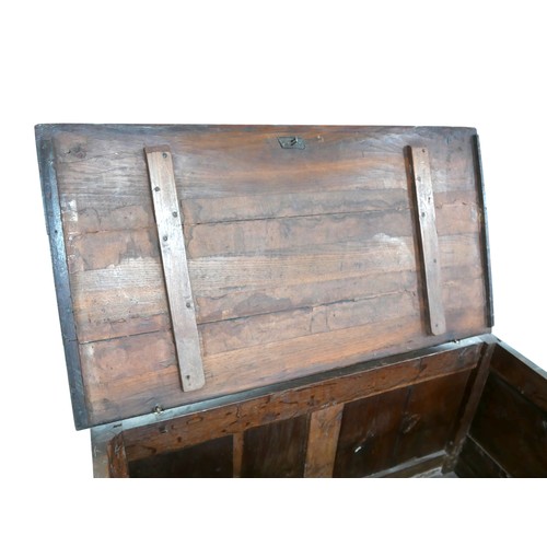 606 - An 18th century oak mule chest, two panel front, ring hinges, raised on stile feet, 112 by 60 by 86c... 